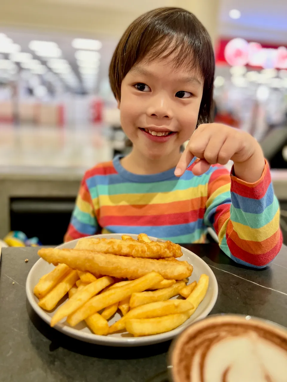 Strangely extra fishy fish and chips, to be upchucked later