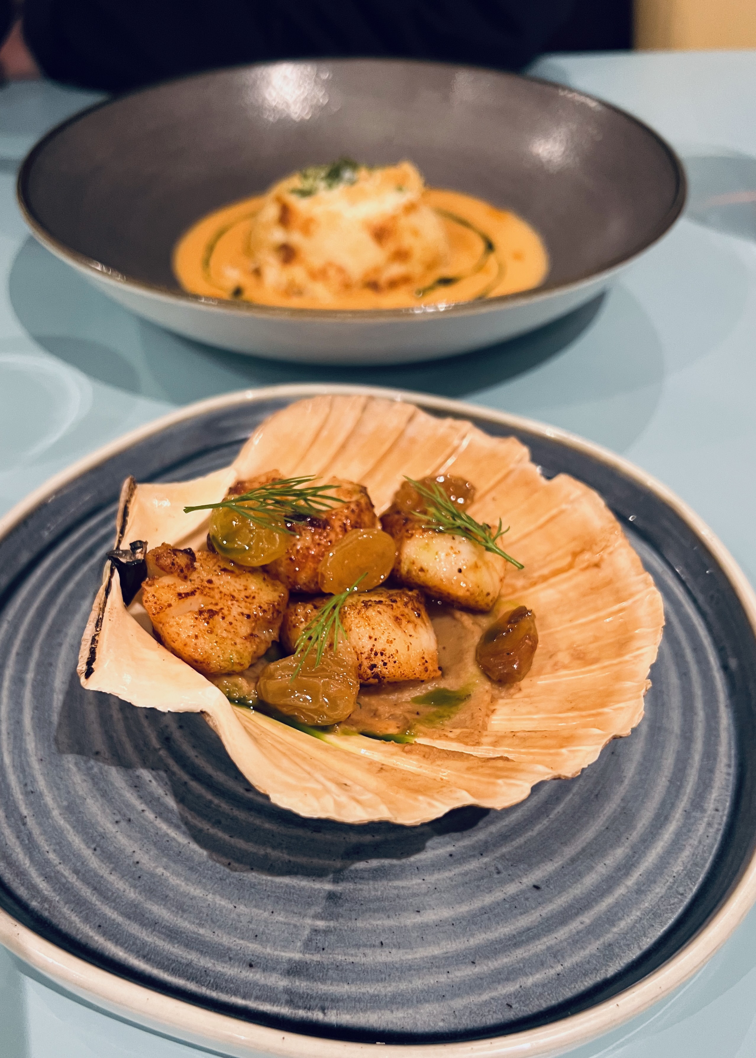 Scallops for me, crab souffle for him