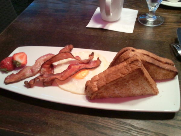 Bacon with fried eggs and toast