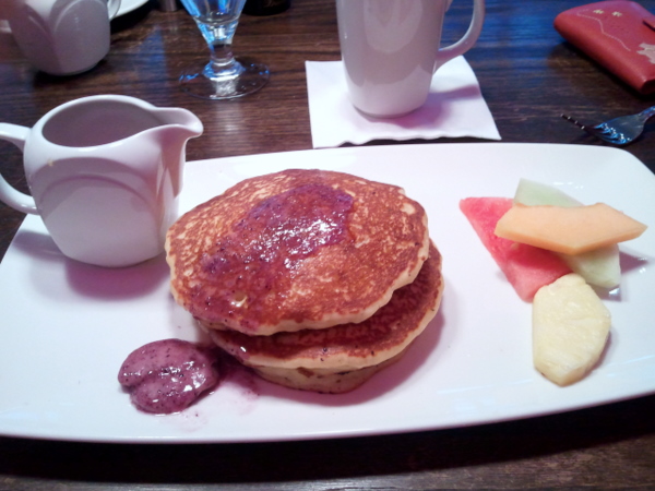 Blueberry pancakes with maple syrup