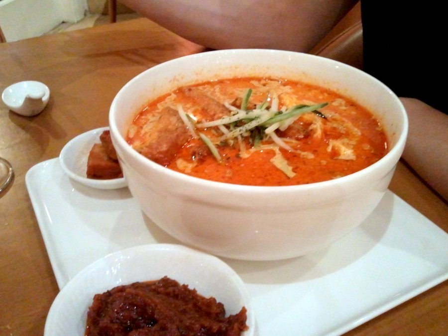 Laksa with prawns, quail eggs, beancurd puff